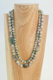 Pale green Howlite, clear Crystal, sterling clasp.