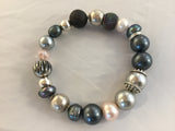 BG2S has 3 colours of fresh water pearls with a sterling ball