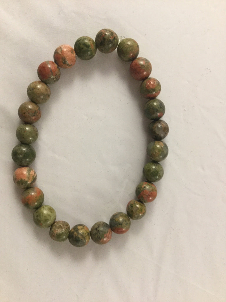 BG6S is a stretch Bracelet for $25 with  8mm green/rust Jasper beads
