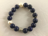 BN1S are navy blue Lapis beads with fish water white Pearl. Image is much darker than the navy stones.