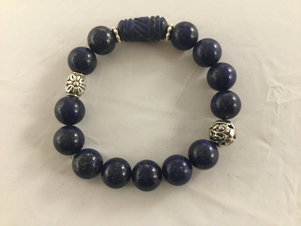 Carved Lapis with 12mm Lapis beads.