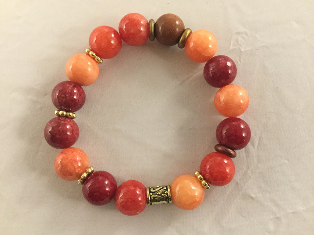 BRO7S has 12mm orange and red Agate with gold filled inserts