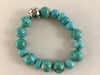 BT5S is made with real 10mm Turquoise beads with 1 12mm silver plated bead with Turquoise/Howlite faceted rondel inserts.