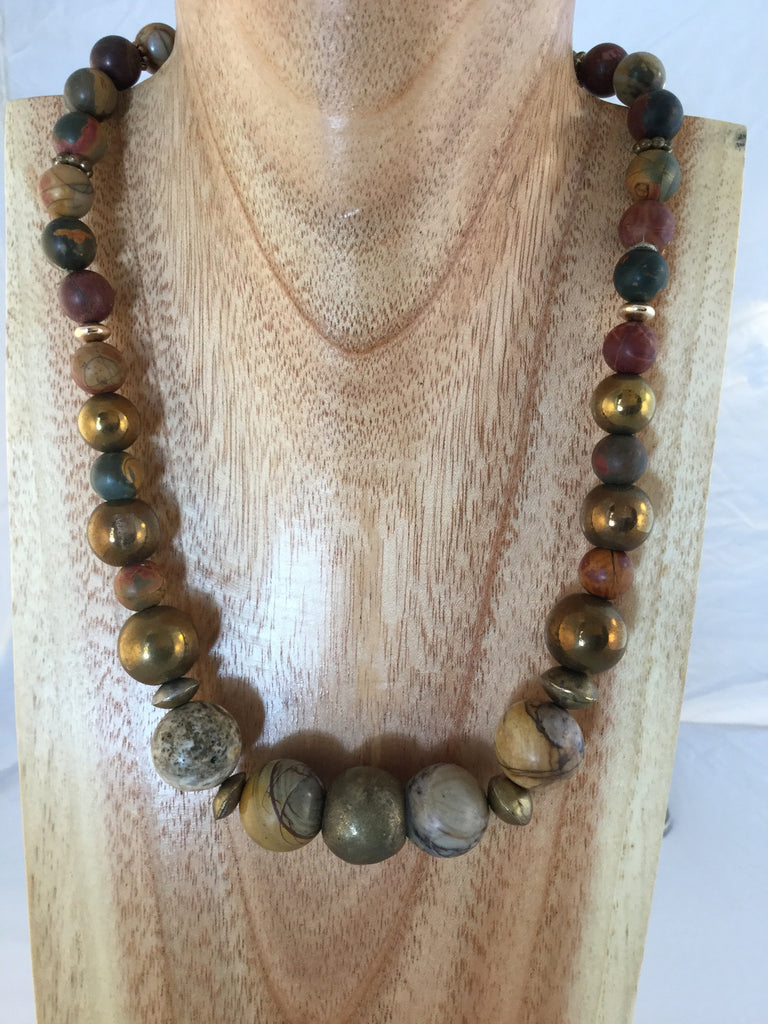 Niki mixes large Jasper with African metal and gold plated inserts.