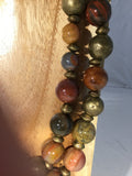 PETRA: petrified wood also blended with African round bronze beads 17mm
