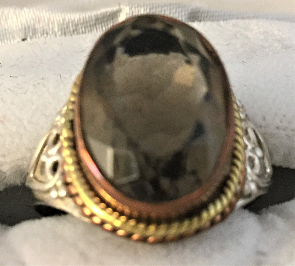 RS24: Sterling Topaz ring with bronze accents